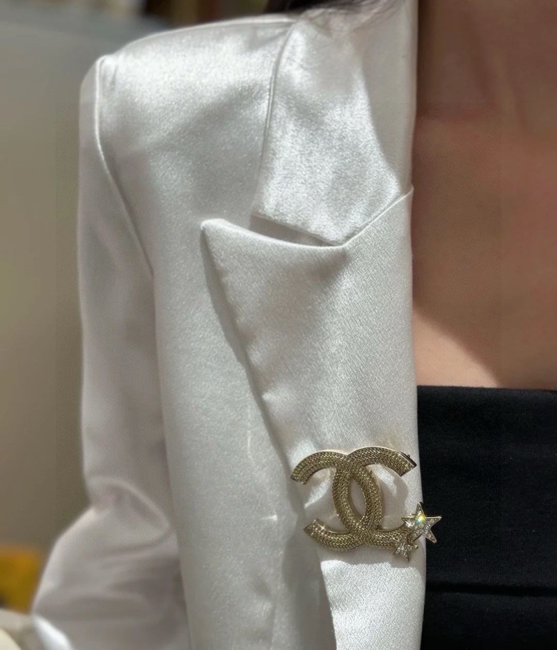 Ch**el brooches
